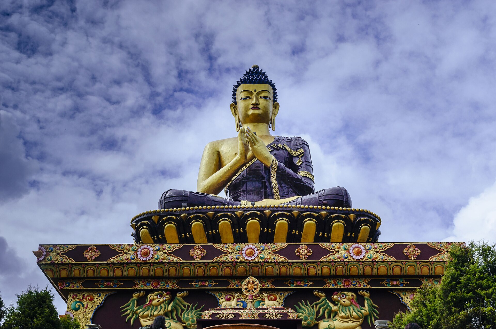 Himalayan Buddhist monument with mountain backdrop